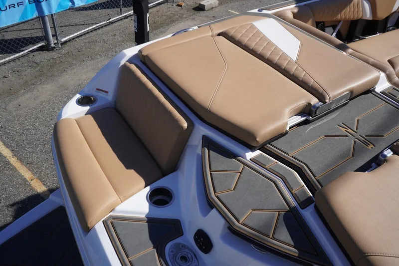 Slide: The Image of 2025 Tigé Z3 boat interior with tan upholstery and modern design elements. - 12
