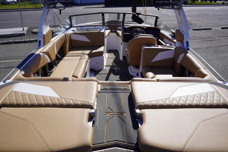 Slide: The Image of 2025 Tigé Z3 boat interior with luxurious tan seating and modern design. - 14