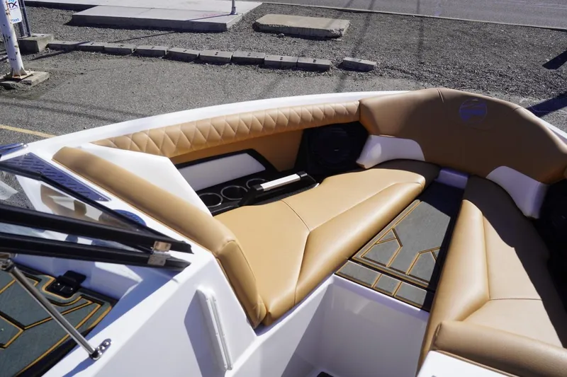 Slide: The Image of 2025 Tigé Z3 boat interior with tan leather seating and modern design. - 18