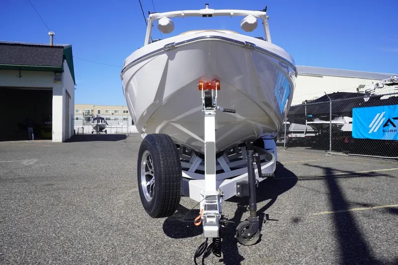 Slide: The Image of 2025 Tigé Z3 boat on trailer in sunny outdoor setting. - 4