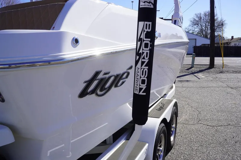 Slide: The Image of 2025 Tigé Z3 boat on trailer, showcasing sleek design and branding. - 8