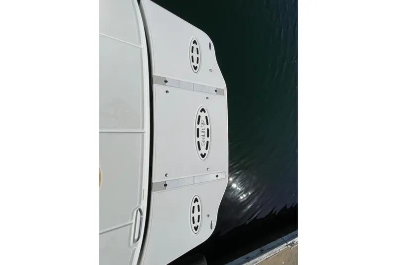 Slide: The Image of Rear view of a 2007 Sea Ray 440 Express swim platform by the water. - 10