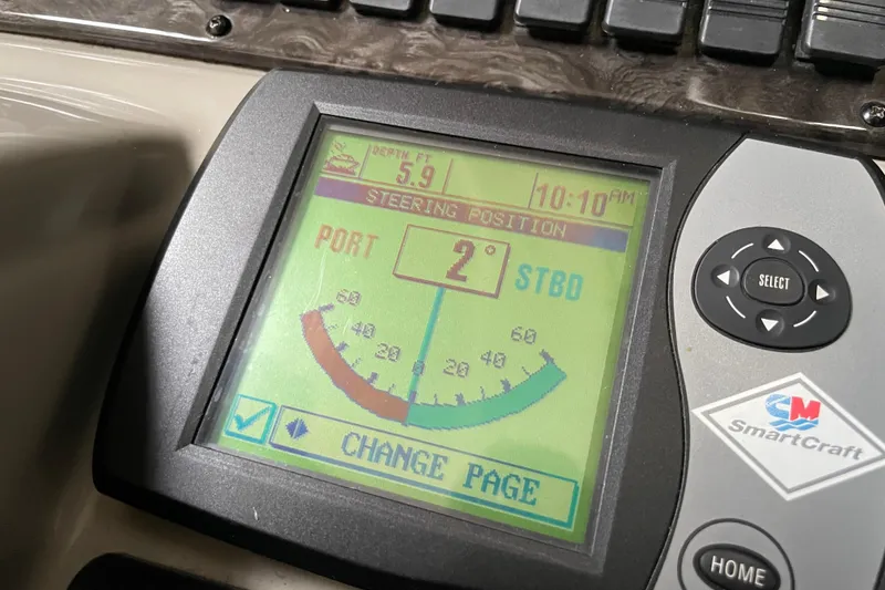Slide: The Image of SmartCraft display on 2007 Sea Ray 440 Express showing steering position and depth. - 19