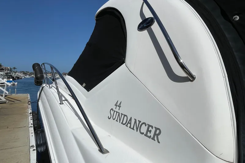 Slide: The Image of 2007 Sea Ray 440 Express Sundancer yacht docked at marina, side view. - 3