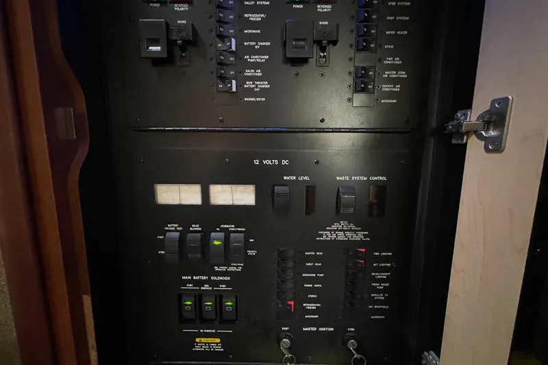 Slide: The Image of Electrical control panel on a 2007 Sea Ray 440 Express boat. - 34