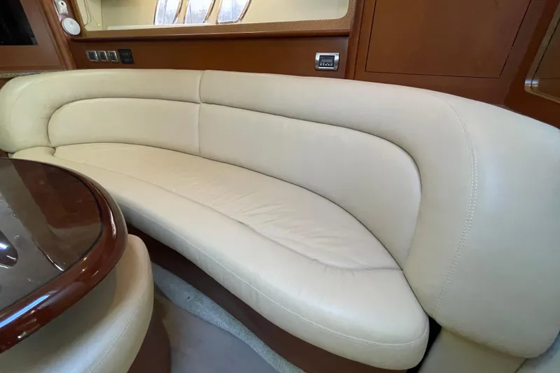 Slide: The Image of Luxurious beige leather seating in 2007 Sea Ray 440 Express yacht interior. - 38