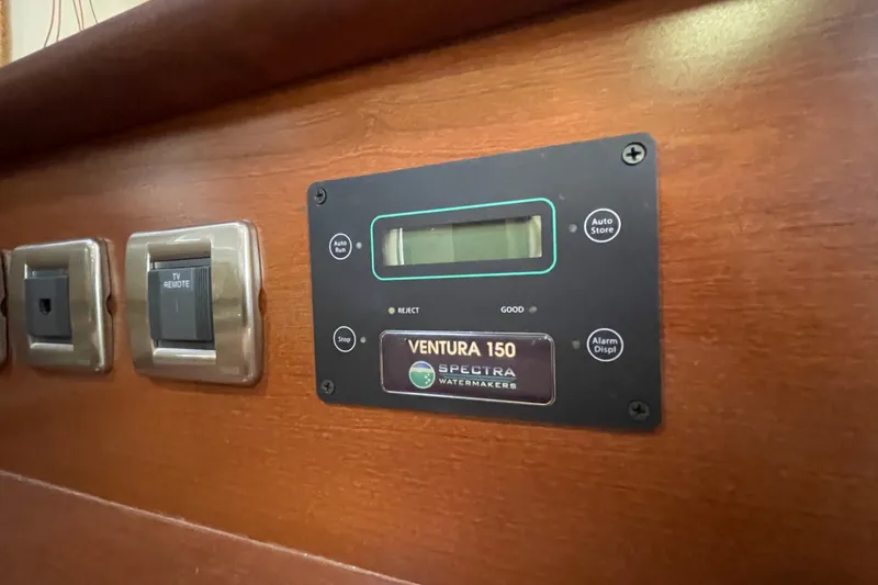 Slide: The Image of Control panel on 2007 Sea Ray 440 Express yacht featuring Ventura 150 Spectra Watermakers. - 40