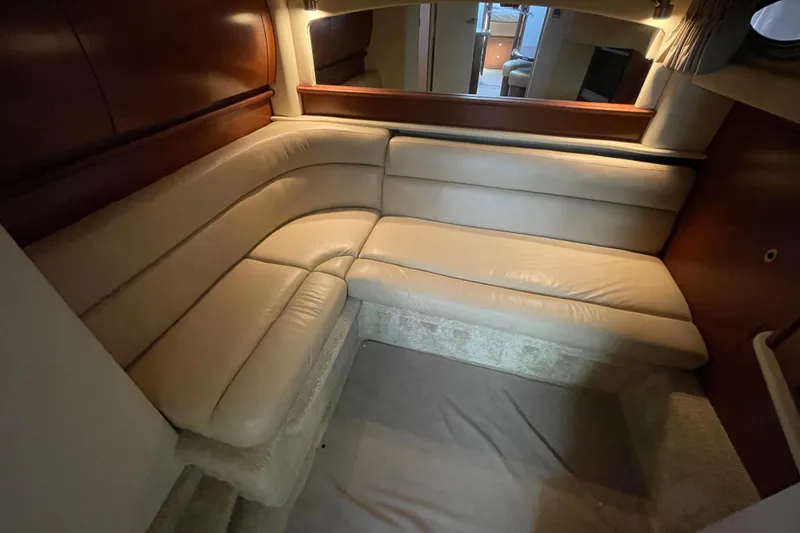 Slide: The Image of Luxurious interior of 2007 Sea Ray 440 Express yacht with plush beige seating. - 45