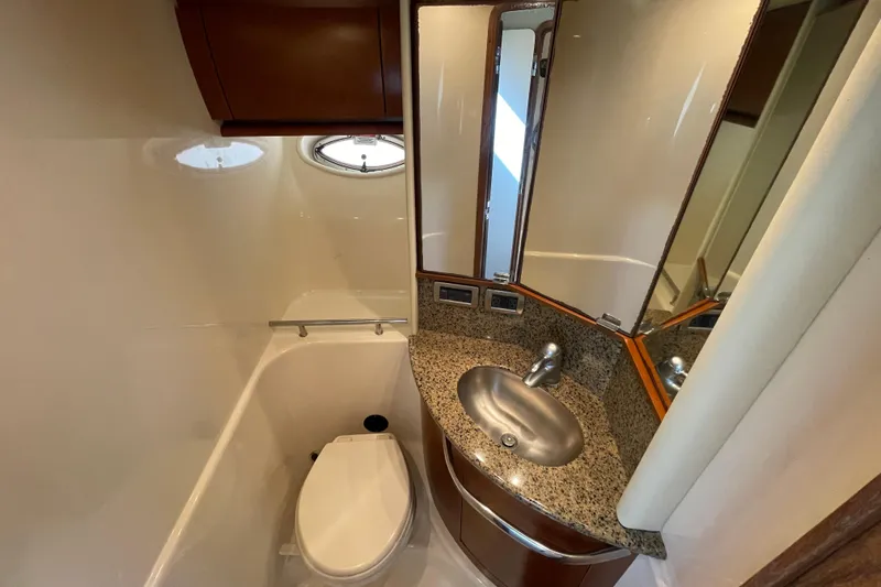Slide: The Image of Luxurious bathroom in 2007 Sea Ray 440 Express yacht with granite countertop and modern fixtures. - 49