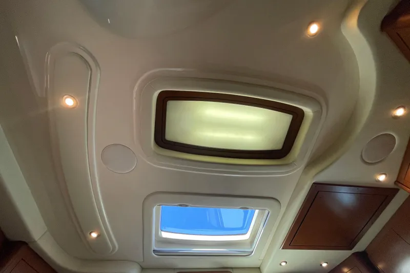 Slide: The Image of Ceiling view of 2007 Sea Ray 440 Express with skylights and recessed lighting. - 53