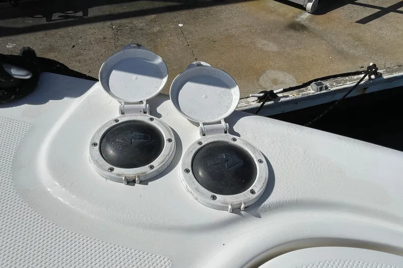 Slide: The Image of Fuel caps on a 2007 Sea Ray 440 Express boat deck. - 8