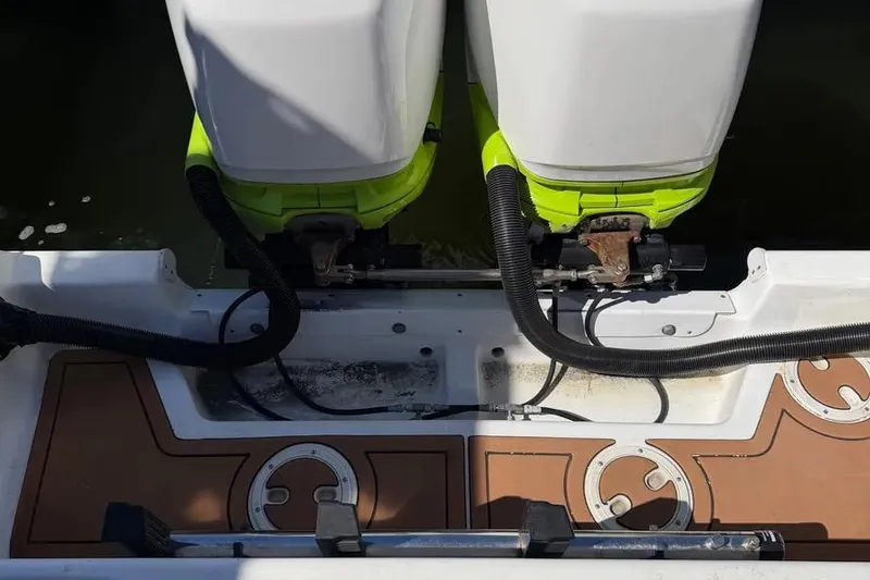 Slide: The Image of Twin outboard motors on a 1993 Fountain 31 Tournament Edition boat. - 16