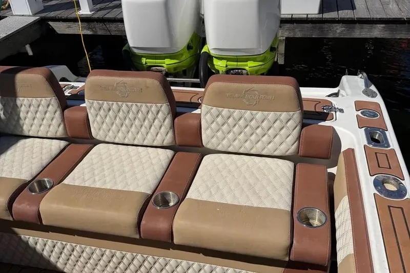Slide: The Image of Luxurious seating on a 1993 Fountain 31 Tournament Edition boat with dual engines. - 8