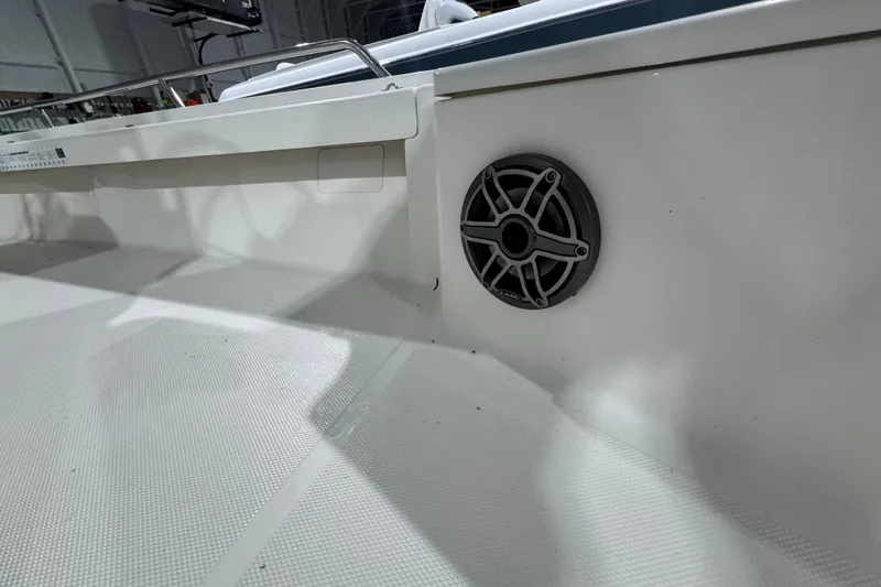 Slide: The Image of 2017 Mako 21 LTS boat interior with speaker detail. - 26