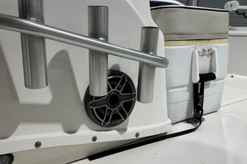 Slide: The Image of Rod holders and speaker on a 2017 Mako 21 LTS boat deck. - 30