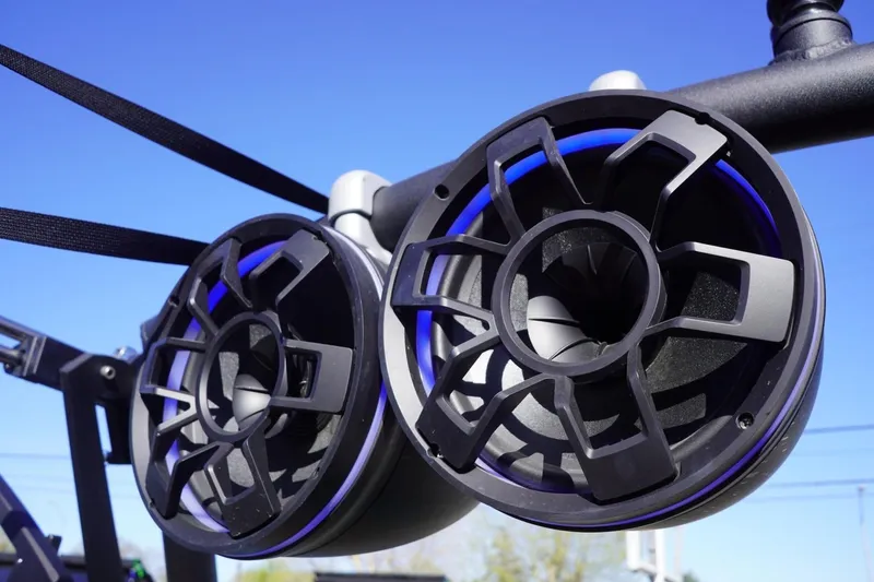 Slide: The Image of 2023 Axis T235 boat speakers with blue accents against clear sky. - 21
