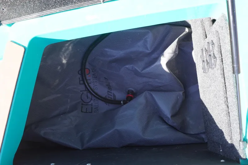 Slide: The Image of 2023 Axis T235 boat ballast compartment with Eight.3 Ballast Systems bag. - 28