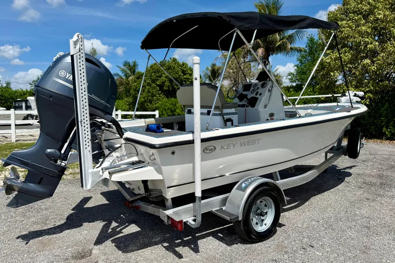 Slide: The Image of 2023 Key West 188 Bay Reef boat on trailer with Yamaha outboard motor. - 29