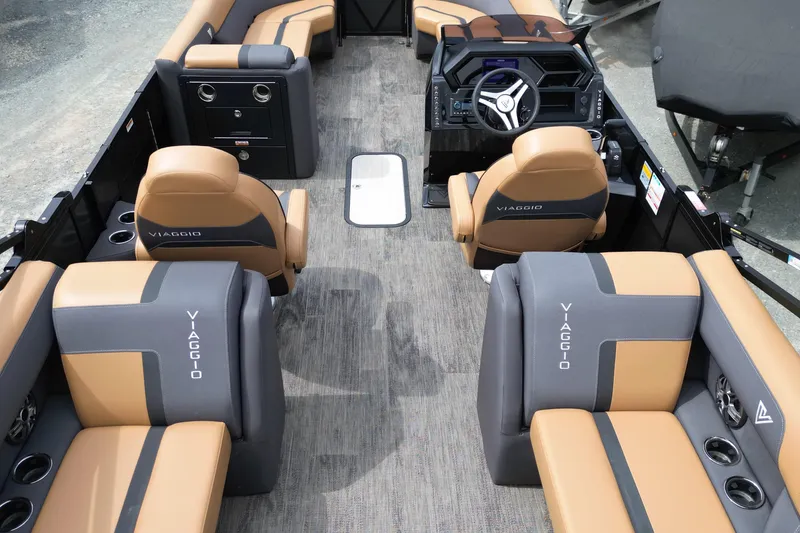 Slide: The Image of Luxurious interior of 2025 Viaggio Lago X-U 24 boat with plush seating and modern dashboard. - 14