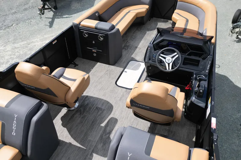 Slide: The Image of Interior of 2025 Viaggio Lago X-U 24 boat with tan and gray seating. - 15
