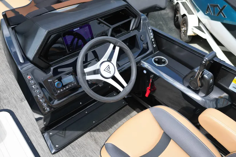 Slide: The Image of Cockpit of 2025 Viaggio Lago X-U 24 boat with modern steering and controls. - 16