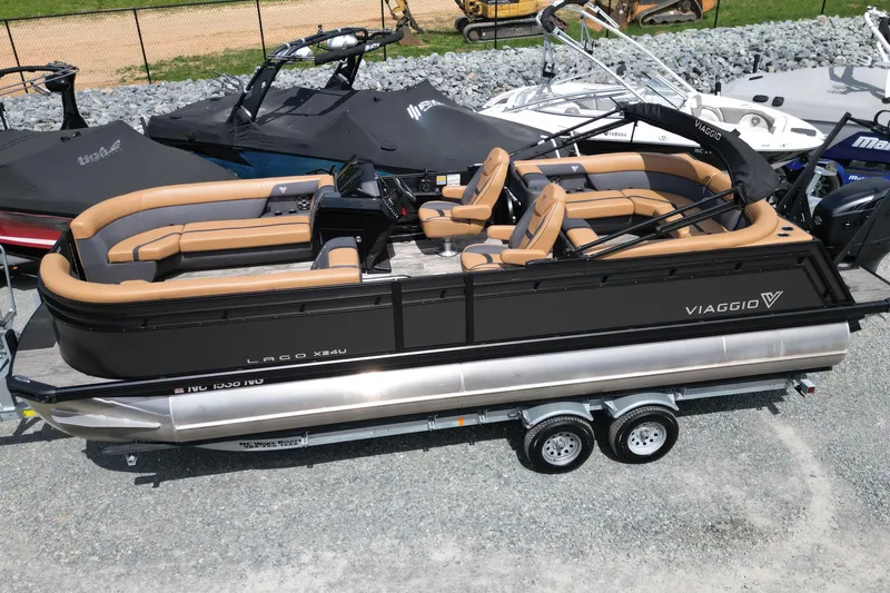 Slide: The Image of 2025 Viaggio Lago X-U 24 pontoon boat with luxurious seating and sleek design. - 4