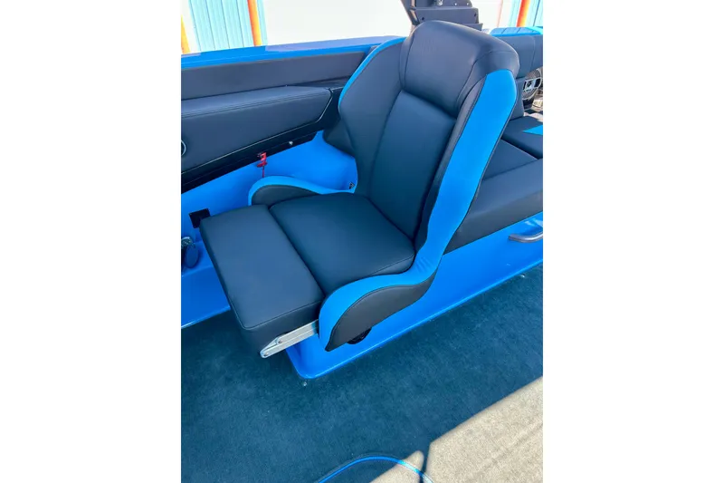 Slide: The Image of 2021 MasterCraft NXT24 boat seat in blue and black upholstery. - 53