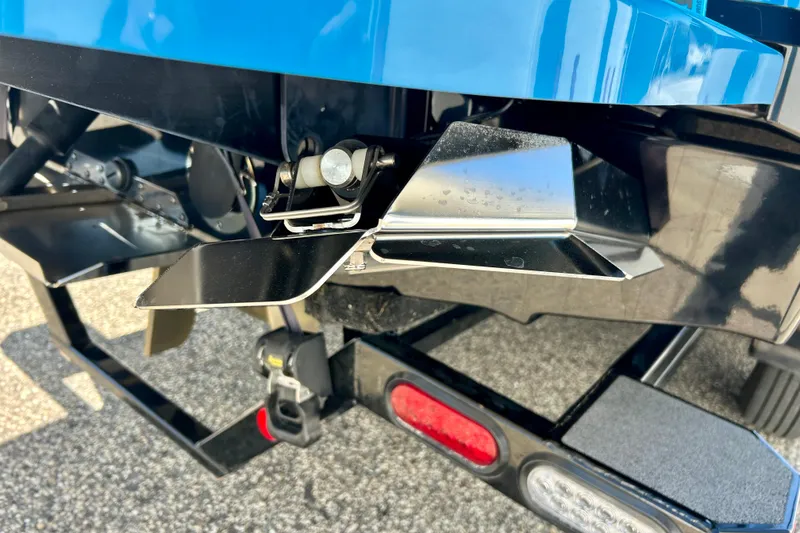 Slide: The Image of Rear view of a 2021 MasterCraft NXT24 boat trailer with metal components. - 71
