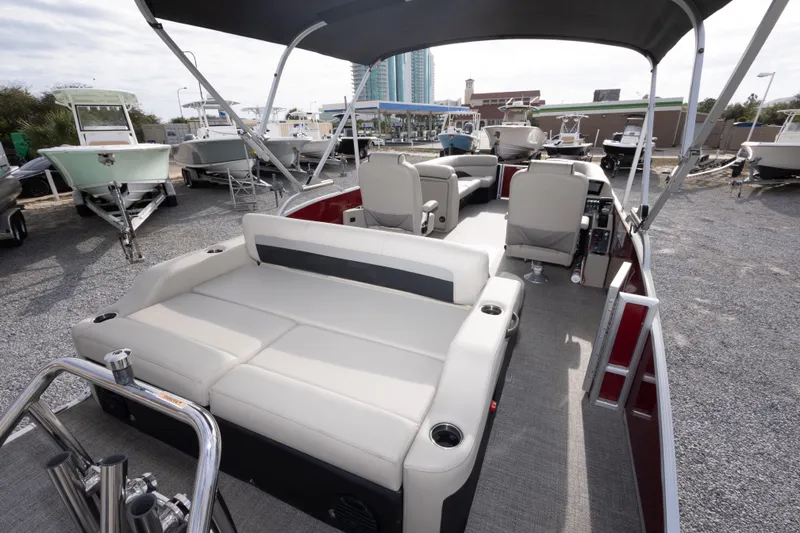 Slide: The Image of 2021 Barletta C24UC pontoon boat with spacious seating and modern design. - 25