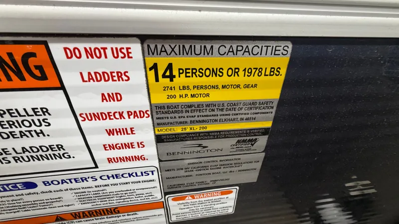 Slide: The Image of Bennington 25GSRCFB SPS TRI 2018 capacity label, 14 persons or 1978 lbs. - 8