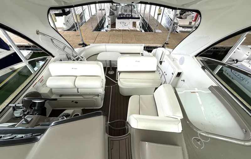 Slide: The Image of Interior of a 2008 Cruiser Yachts 420 with white seating. - 13