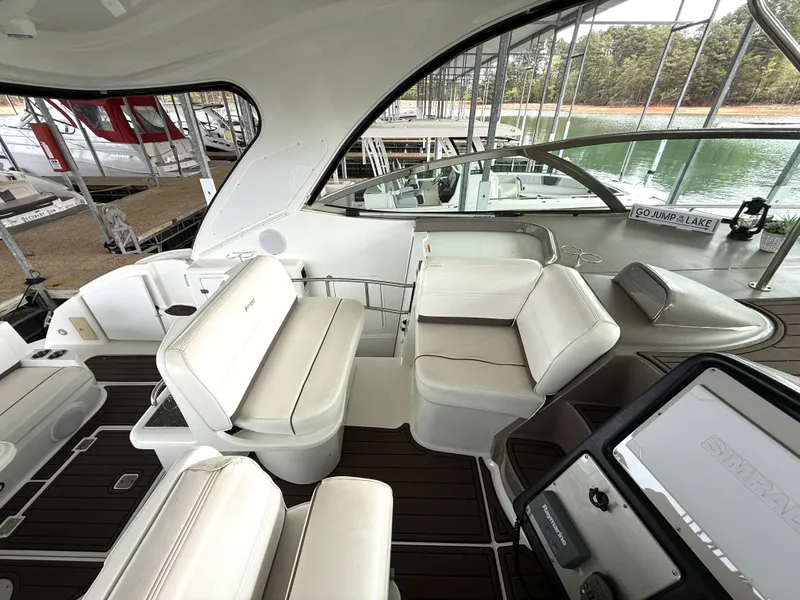 Slide: The Image of Interior of a 2008 Cruiser Yachts 420 with white seating. - 14
