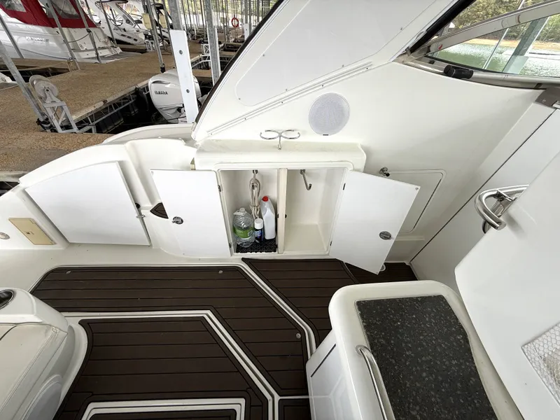 Slide: The Image of Interior of a 2008 Cruiser Yachts 420 with storage and wood flooring. - 20