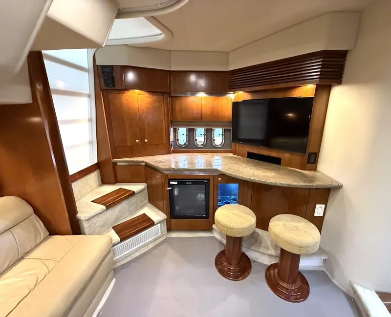 Slide: The Image of Interior of 2008 Cruiser Yachts 420 with bar and TV. - 27