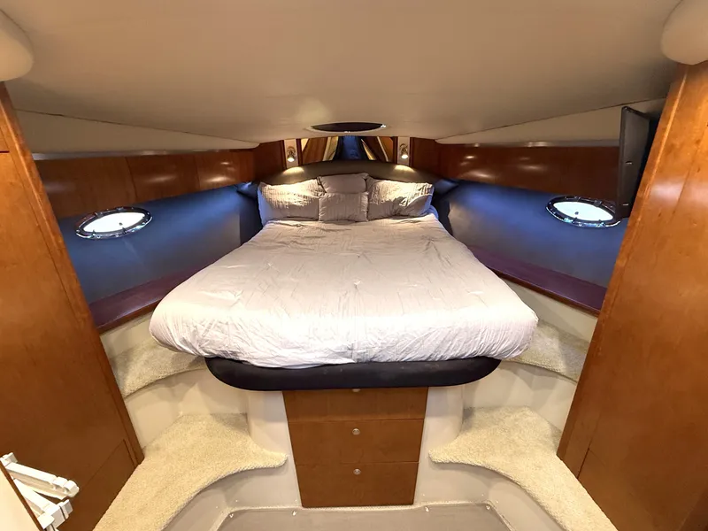 Slide: The Image of Luxurious cabin of 2008 Cruiser Yachts 420 with double bed. - 28
