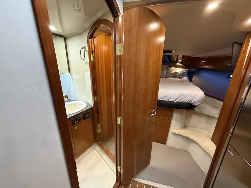 Slide: The Image of Interior of a 2008 Cruiser Yachts 420 with bedroom and bathroom. - 33