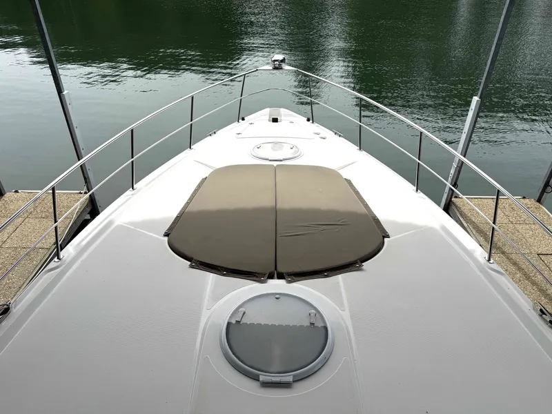 Slide: The Image of 2008 Cruiser Yachts 420 docked on calm water. - 35