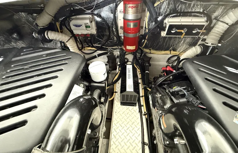 Slide: The Image of Engine room of a 2008 Cruiser Yachts 420 with technical details. - 39