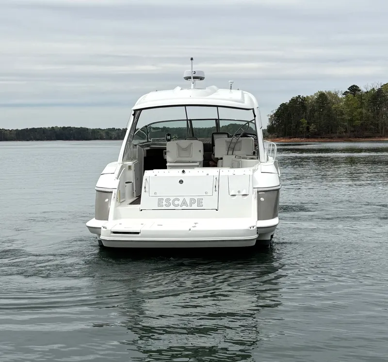 Slide: The Image of Rear view of a 2008 Cruiser Yachts 420 on calm water. - 5