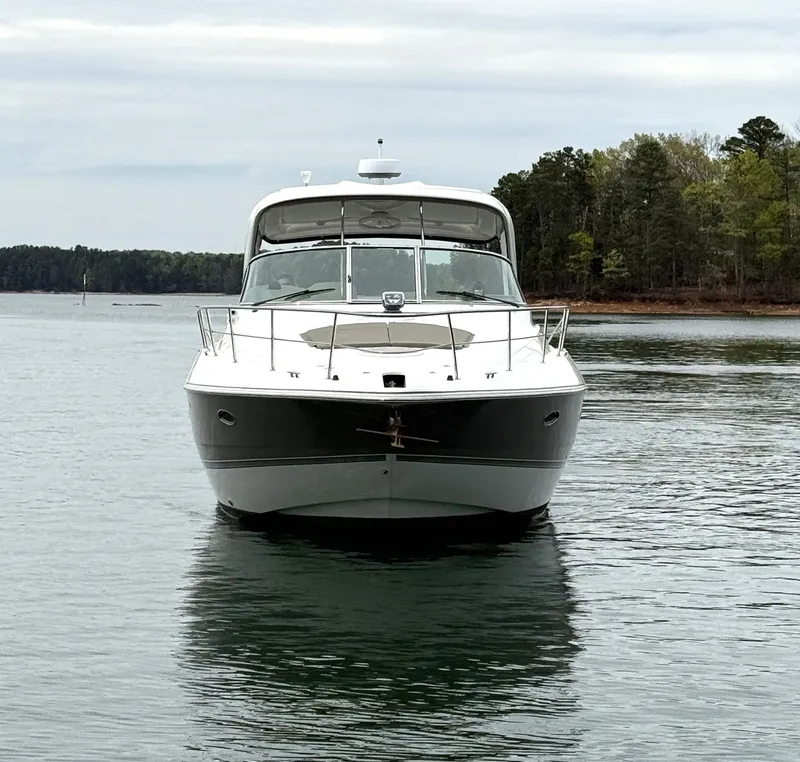 Slide: The Image of 2008 Cruiser Yachts 420 anchored on calm water. - 6