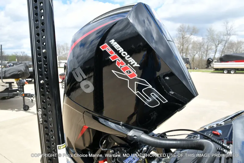Slide: The Image of 2025 Ranger Z520R with Mercury Pro XS engine outdoors. - 18