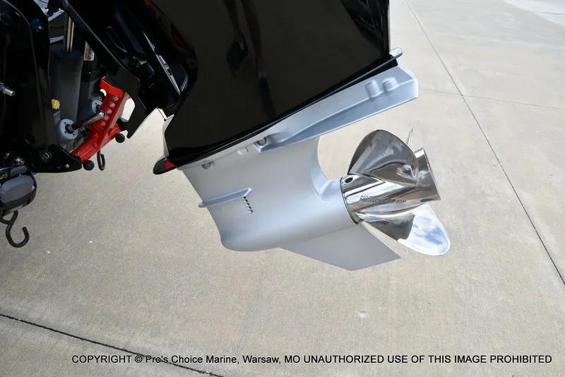 Slide: The Image of Ranger Z520R 2025 boat motor with shiny propeller. - 24