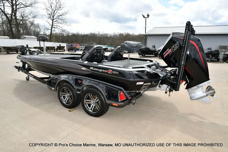 Slide: The Image of 2025 Ranger Z520R Cup Equipped boat on trailer outdoors. - 26