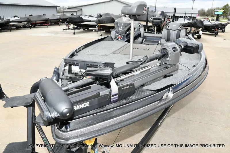 Slide: The Image of 2025 Ranger Z520R Cup Equipped boat in a parking lot. - 32