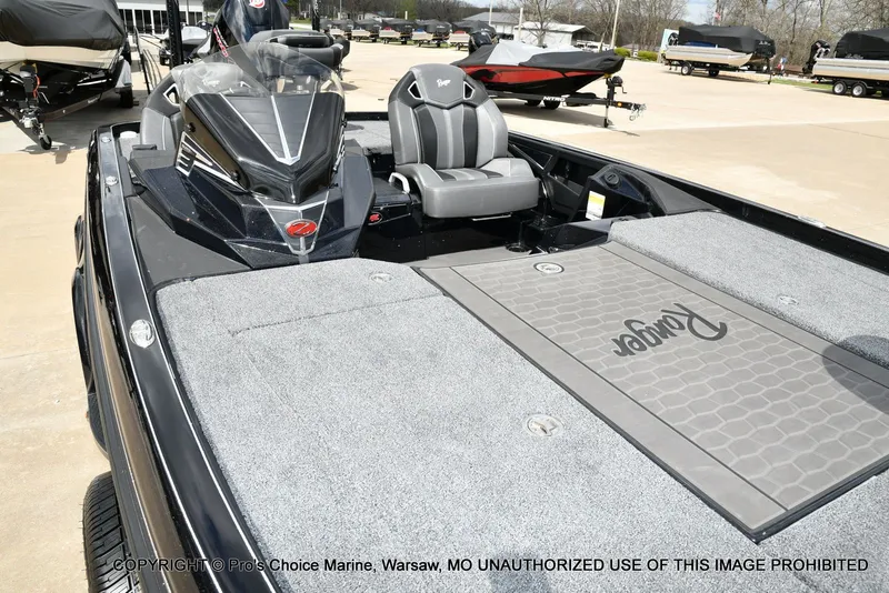Slide: The Image of 2025 Ranger Z520R Cup Equipped boat on a parking lot. - 36