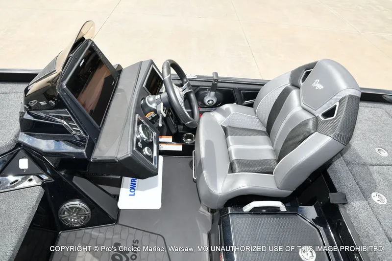 Slide: The Image of Interior of 2025 Ranger Z520R Cup Equipped with gray seat and control console. - 48