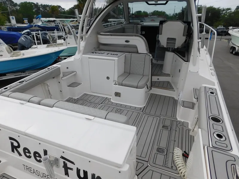 Slide: The Image of 2023 Pursuit OS 325 Offshore boat with spacious cockpit. - 9