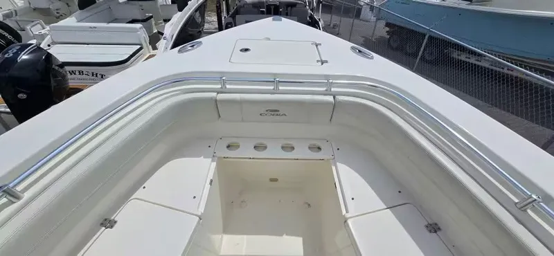 Slide: The Image of 2018 Cobia 301 Center Console boat, front deck view. - 13