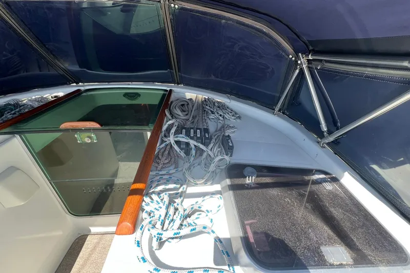 Slide: The Image of Cockpit of 2001 Beneteau Oceanis 461 sailboat with ropes and canopy. - 12