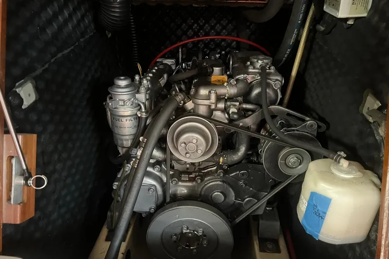 Slide: The Image of Engine compartment of a 2001 Beneteau Oceanis 461 sailboat, showcasing detailed mechanics. - 42